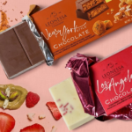 Three city-themed Leonessa chocolate bars representing Dubai, New York, and Los Angeles.