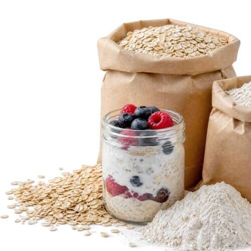 Kraft paper bags of flour and rolled oats with spilled oats and a jar of overnight oats on white, with the Bob's Red Mill logo