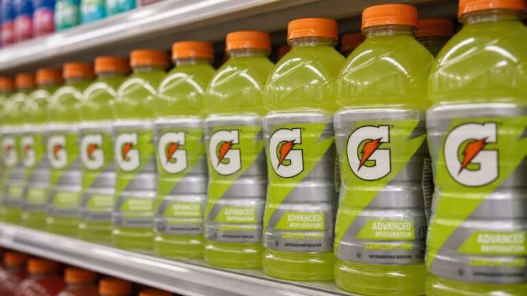 Illustration: a supermarket shelf of 28-ounce Gatorade Lemon Lime bottles