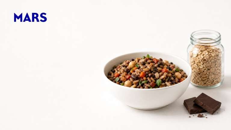 Bowl of rice, lentils, chickpeas and vegetables beside a jar of oats and dark chocolate, with the Mars logo